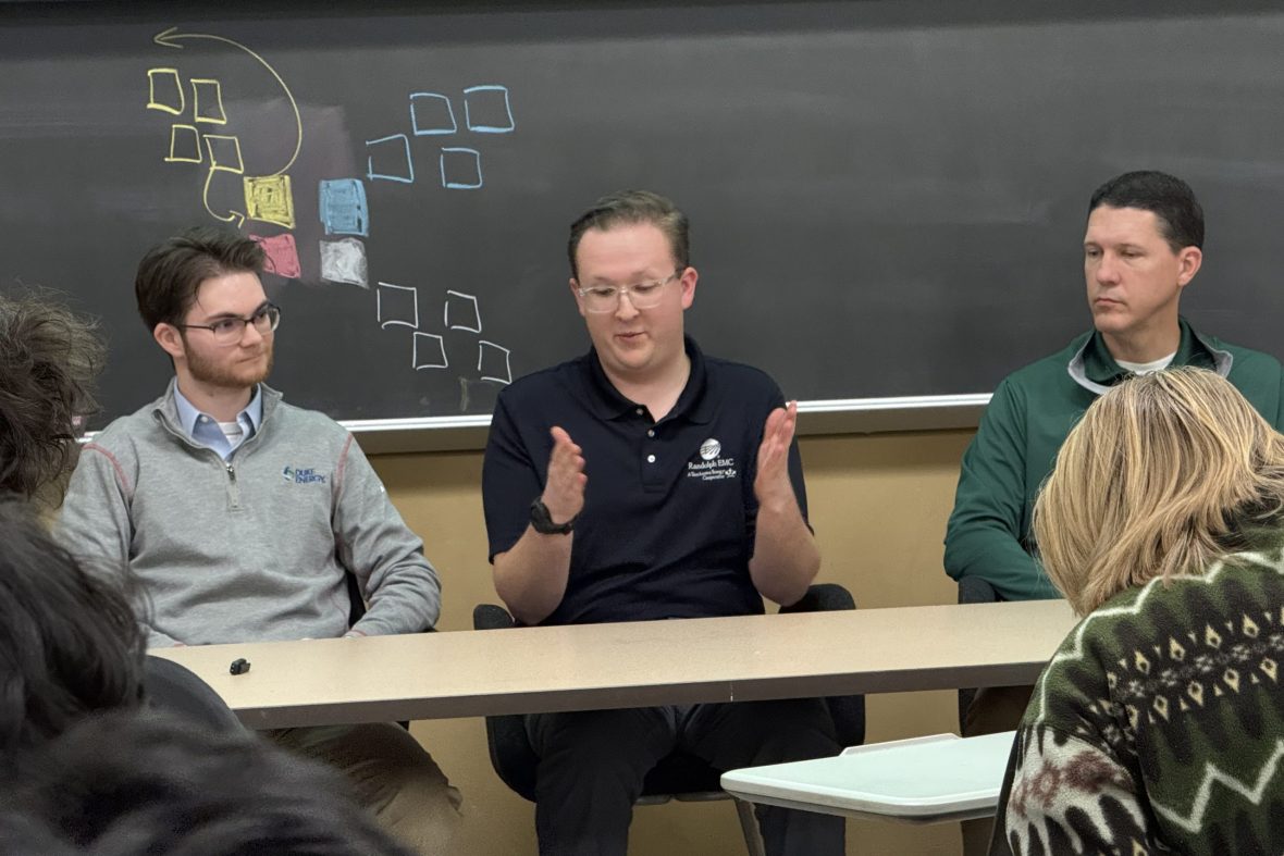 Three faculty members leading a career panel