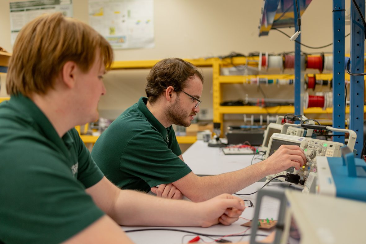 Undergraduate students working in lab
