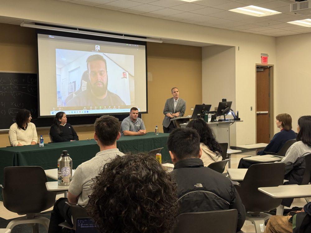 Panel of company representatives talking to students